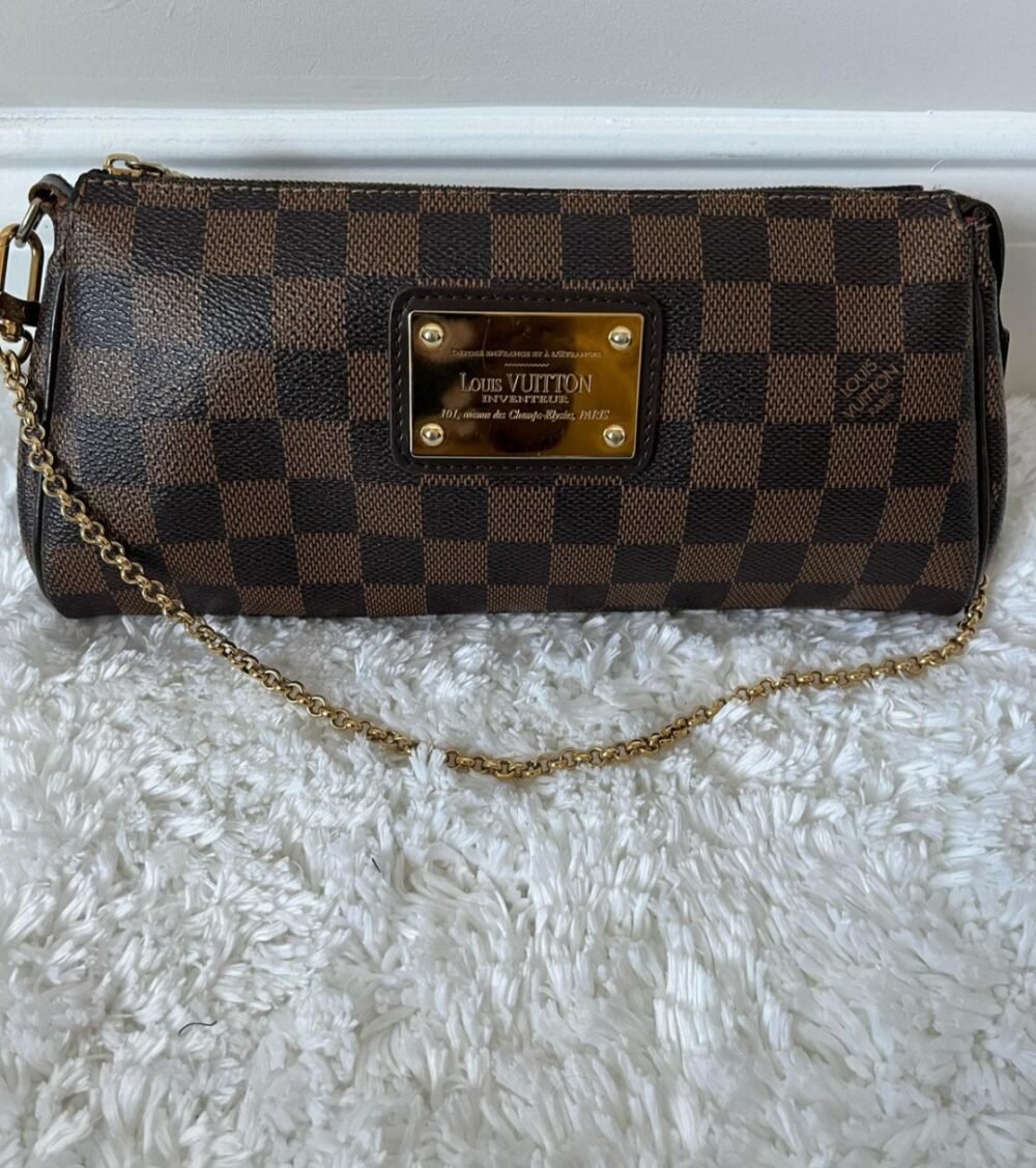 Louis Vuitton Crossbody DAMIER EBENE SHOULDER BAG LOUIS VUITTON EVA SHOULDER BAG. Condition is Pre-owned. Very good condition.